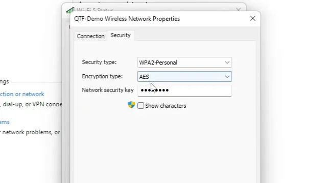 Tab Security di Wireless Network Properties dengan opsi Show characters